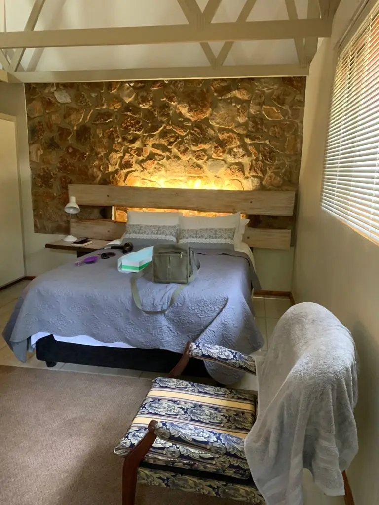 A room with a stone wall